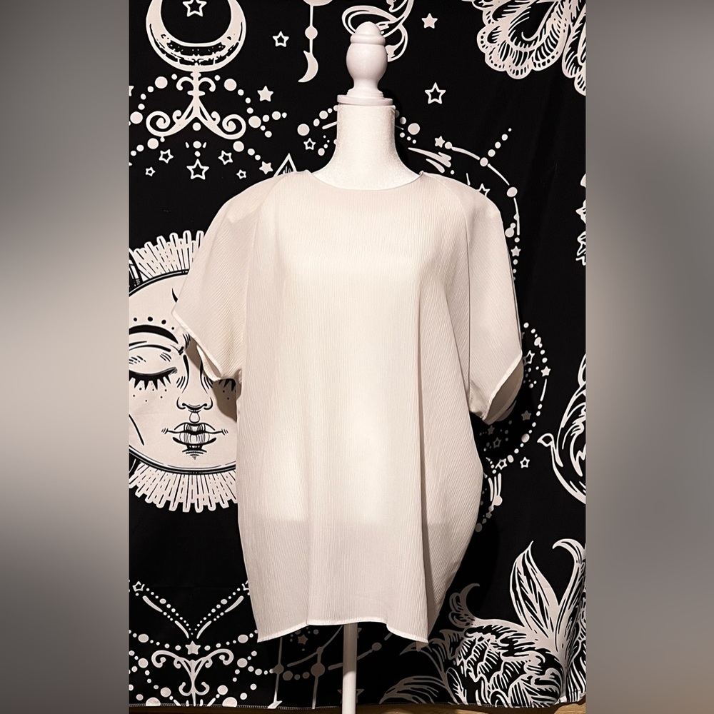 Woman’s white top